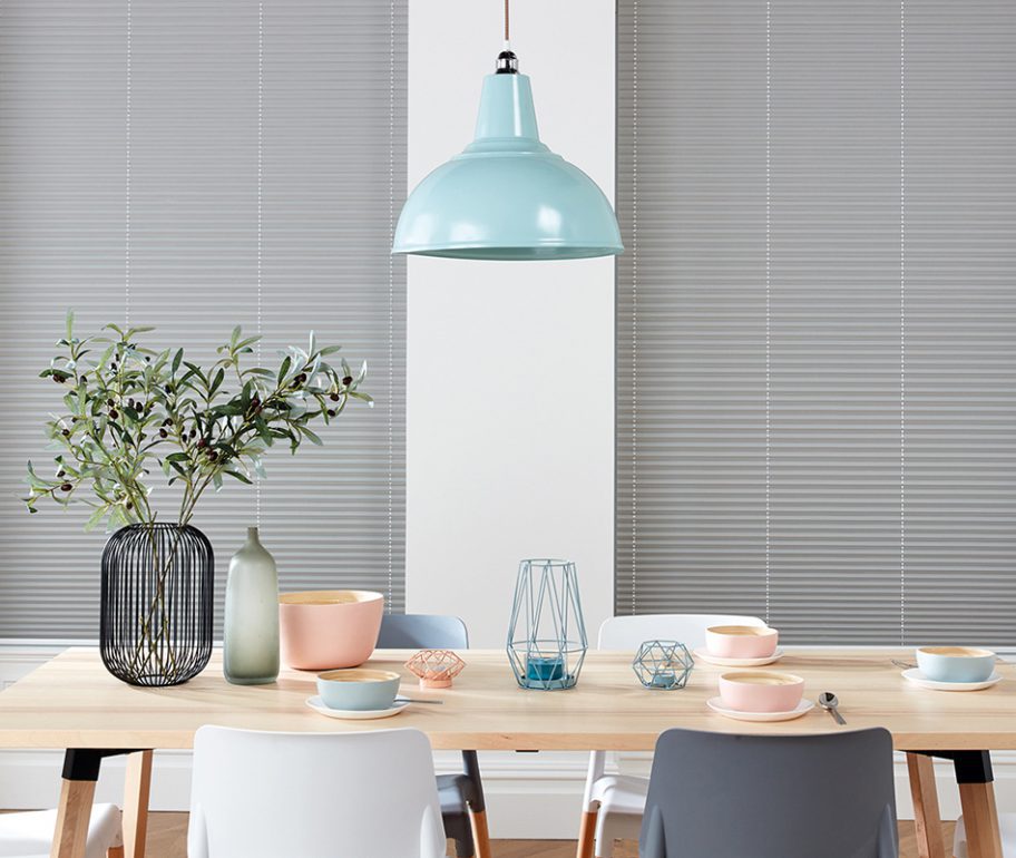 Closed grey duette blinds in dining room