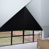 Triangle window blinds in bedroom